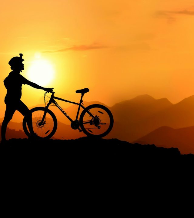 pexels-jahangeer-bm-759527-1619299 Silhouette of a cyclist at sunrise