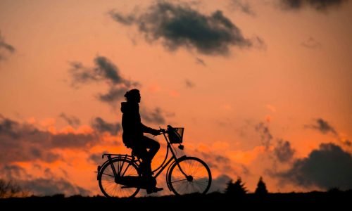 pexels-pixabay-37836 Cyclist at sunset with orange sky